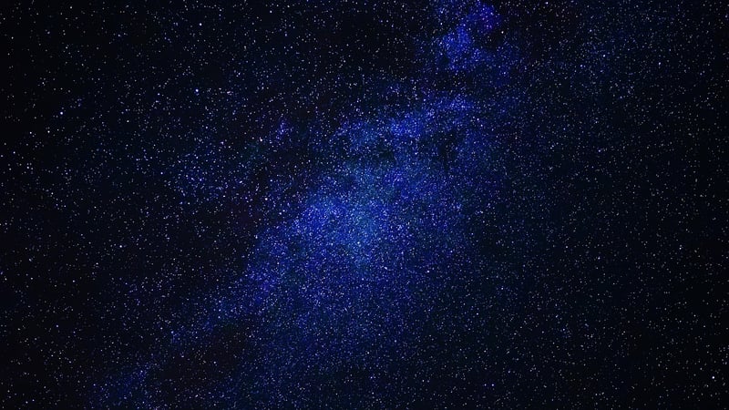 Starry sky over a cave